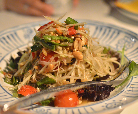 Som Dtum – thai-bpu - $14.00 – Green papaya salad with peanuts and dried shrimps with the addition of pickled crab