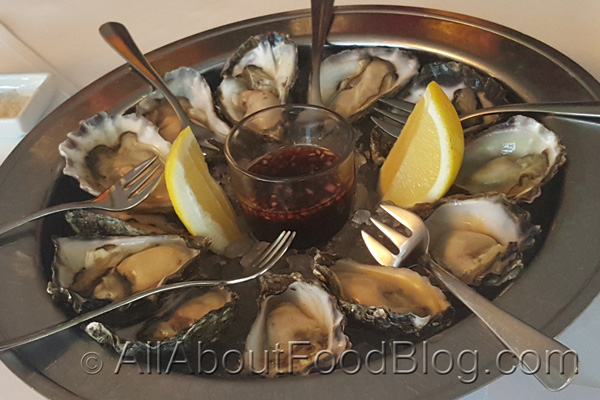 Fresh oysters with lemon and Catalina’s vinaigrette